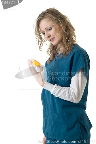 Image of Nurse reading the label