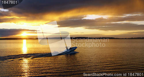 Image of The motorboat tour. Sunset on the lake.