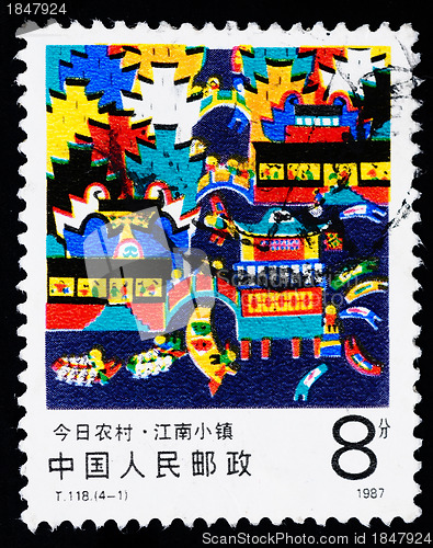 Image of A stamp printed in China shows the modern village