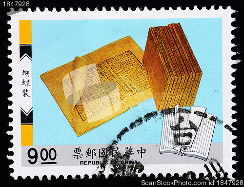 Image of A stamp printed in Taiwan shows ancient books