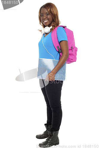 Image of Full length portrait of trendy musical college girl