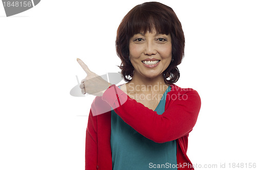 Image of Beautiful woman indication copy space area