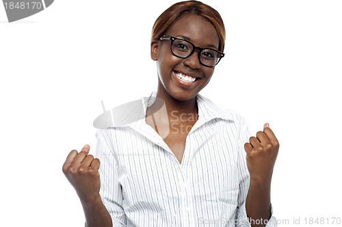 Image of A female expressing her success. Yes, we did it!