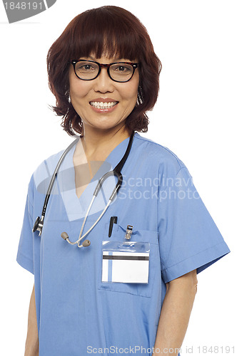 Image of Pleasing female gynecologist posing with stethoscope