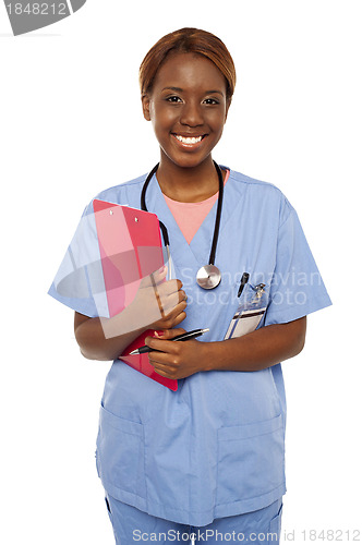 Image of Female practitioner ready to assist senior doctor