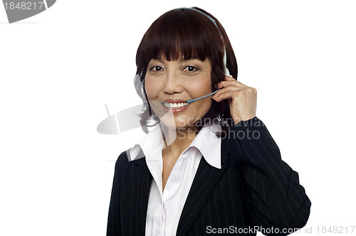 Image of Cheerful asian customer support operator