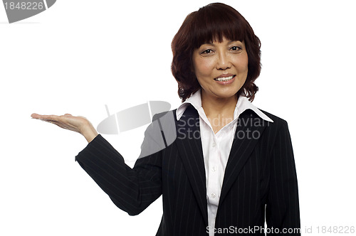 Image of Asian business lady presenting copy space