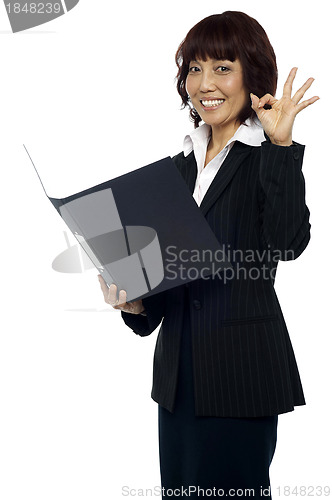 Image of Lady consultant satisfied with the report