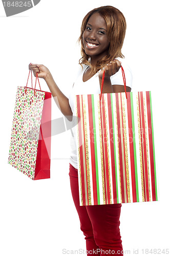 Image of Sale Sale Sale... Woman carrying shopping bags