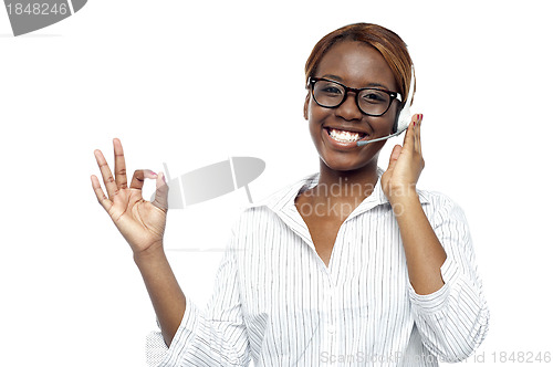 Image of Customer service agent showing okay gesture