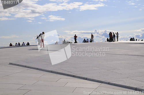 Image of People on top of Oslo´s opera house