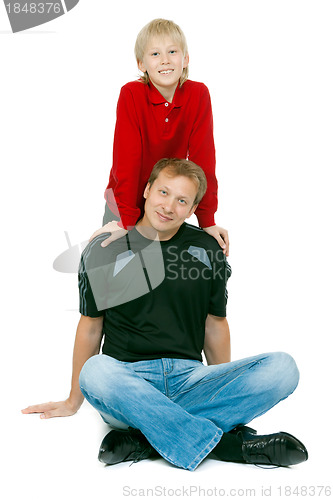 Image of Portrait of father and son in the studio