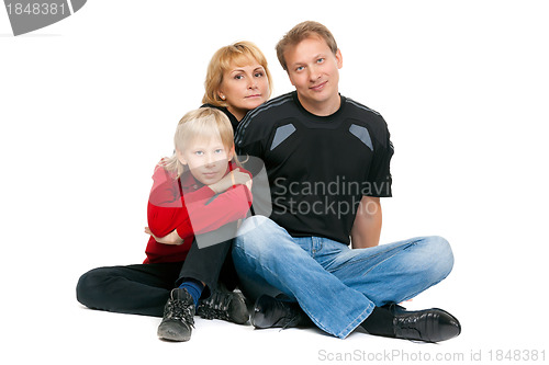 Image of happy family sitting in the lotus position