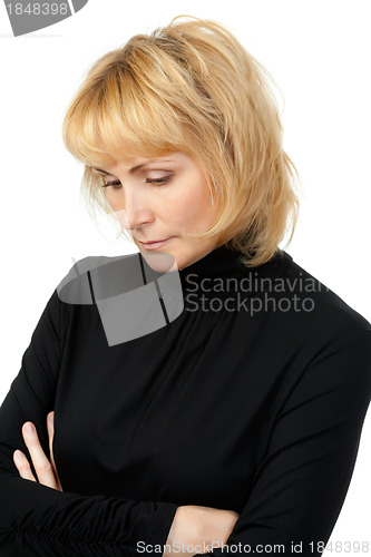 Image of portrait of a girl dressed in black, sad looks away