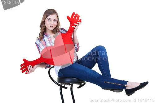 Image of Beautiful girl with A red plush heart