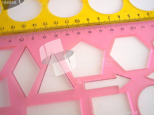 Image of pink and yellow stencils