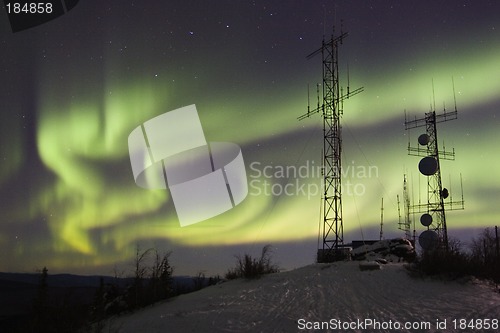 Image of Northern lights above antennas