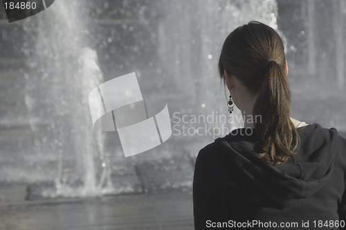 Image of Girl watching fountain