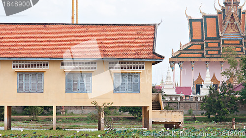 Image of School building and temple in Cambodia