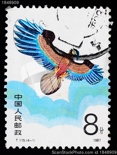 Image of A stamp printed in China shows a kite of eagle figure  in the sky