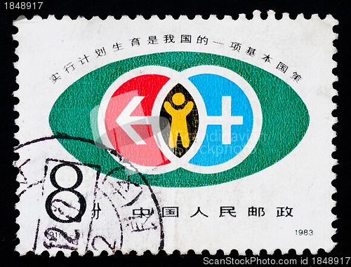 Image of A stamp printed in China shows the family plan policy