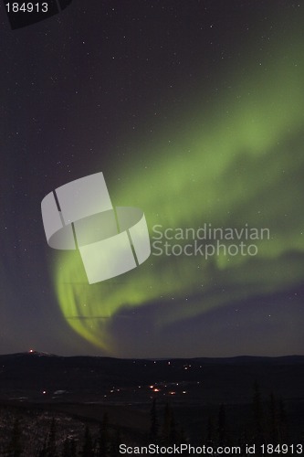 Image of Twisting arc of aurora borealis