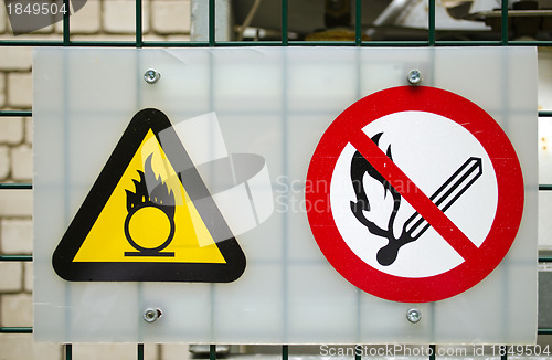 Image of Fire warning signs compressed oxygen gas cylinders 