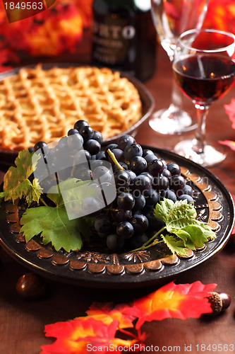 Image of Fresh grapes and glass of wine