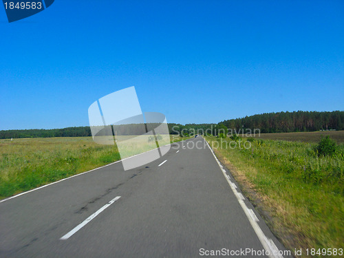 Image of The asphalted road and the blue sky