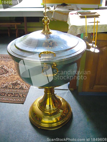 Image of Religious place with metal tub