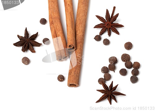 Image of Black peppercorns, anise stars and cinnamon sticks