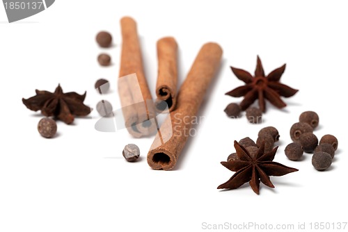 Image of Black peppercorns, anise stars and cinnamon sticks
