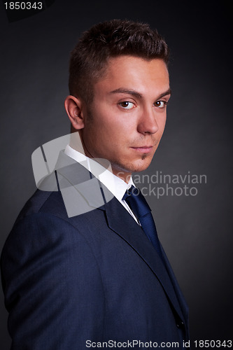 Image of side profile of a business man