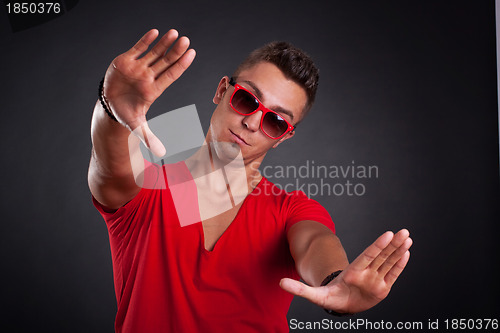 Image of man showing framing hand gesture