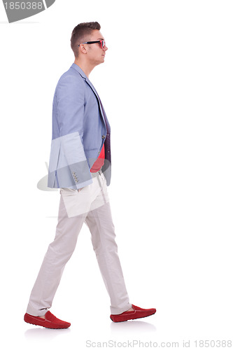 Image of  fashion man walking forward