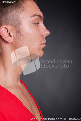 Image of side view of a young casual man