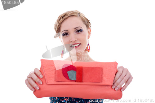 Image of woman presenting a purse