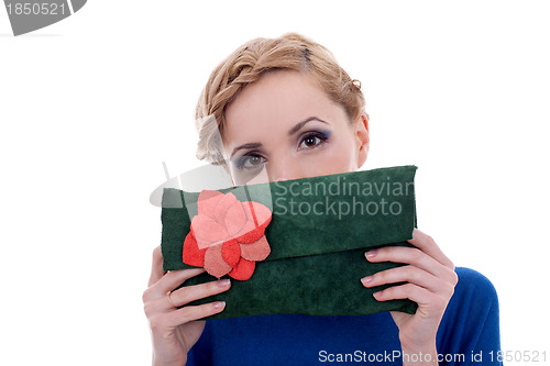 Image of woman hidding her face with purse