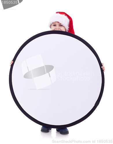 Image of Boy holding a round poster