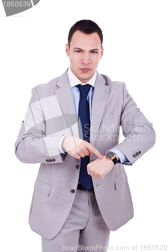 Image of man impatiently pointing to his watch