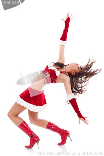 Image of dancing woman in Christmas outfit 