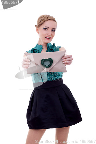 Image of woman presenting a small purse