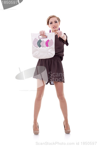 Image of woman with hand bag poniting