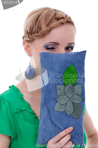 Image of woman with purse winking