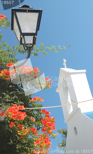 Image of lamp, church, flowers