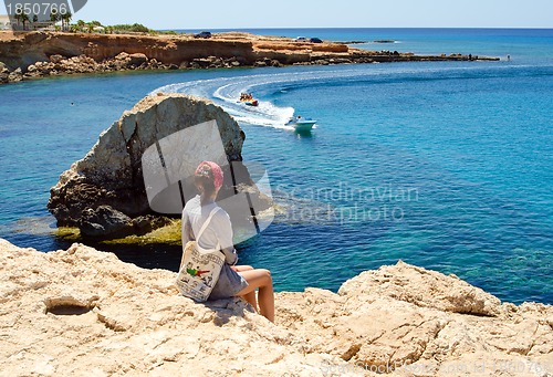 Image of girl on a rock