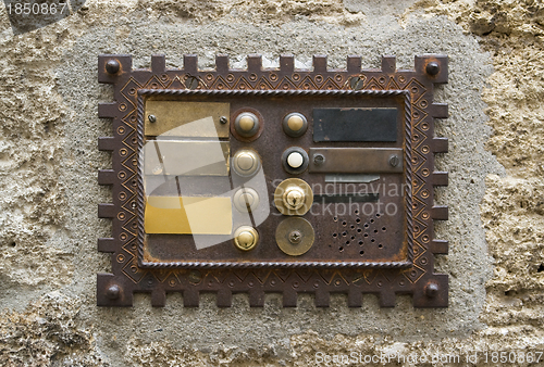 Image of historic doorbell plate