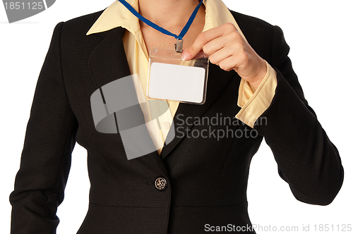 Image of woman showing her badge