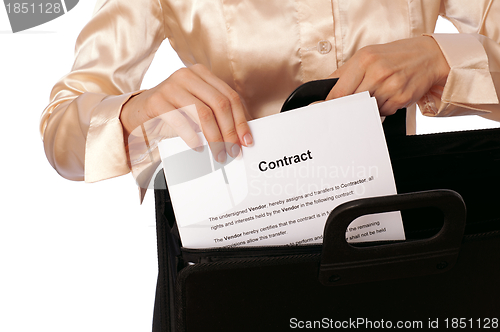 Image of Suitcase with contracts