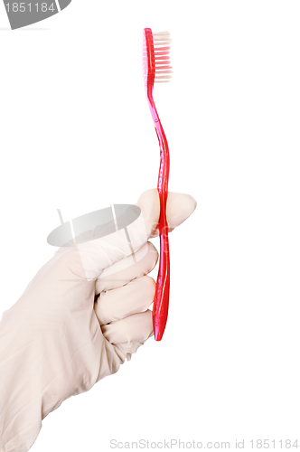 Image of red toothbrush